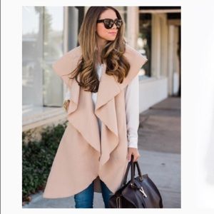 Oversized tan sleeveless lapel vest